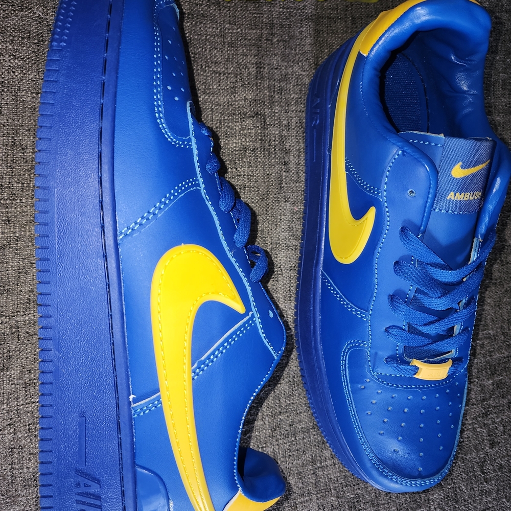 Nike Royal Blue Sneakers with Yellow Swoosh